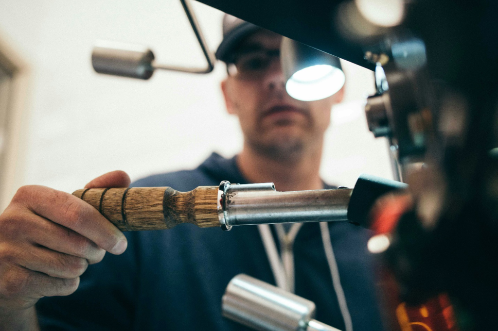 Plumber working with tools.